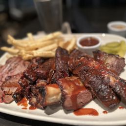 Jack Stack Barbecue signature dishes The Stack, Kansas City Combo, Burnt Ends.